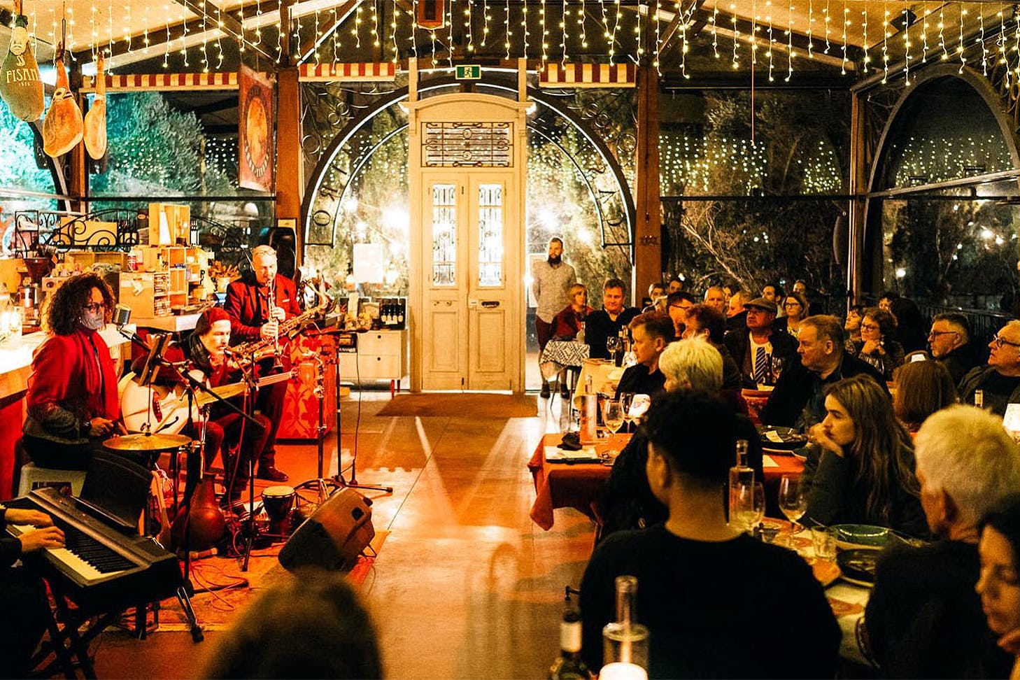 People watch rapt as jazz artists play at Casito Miro.